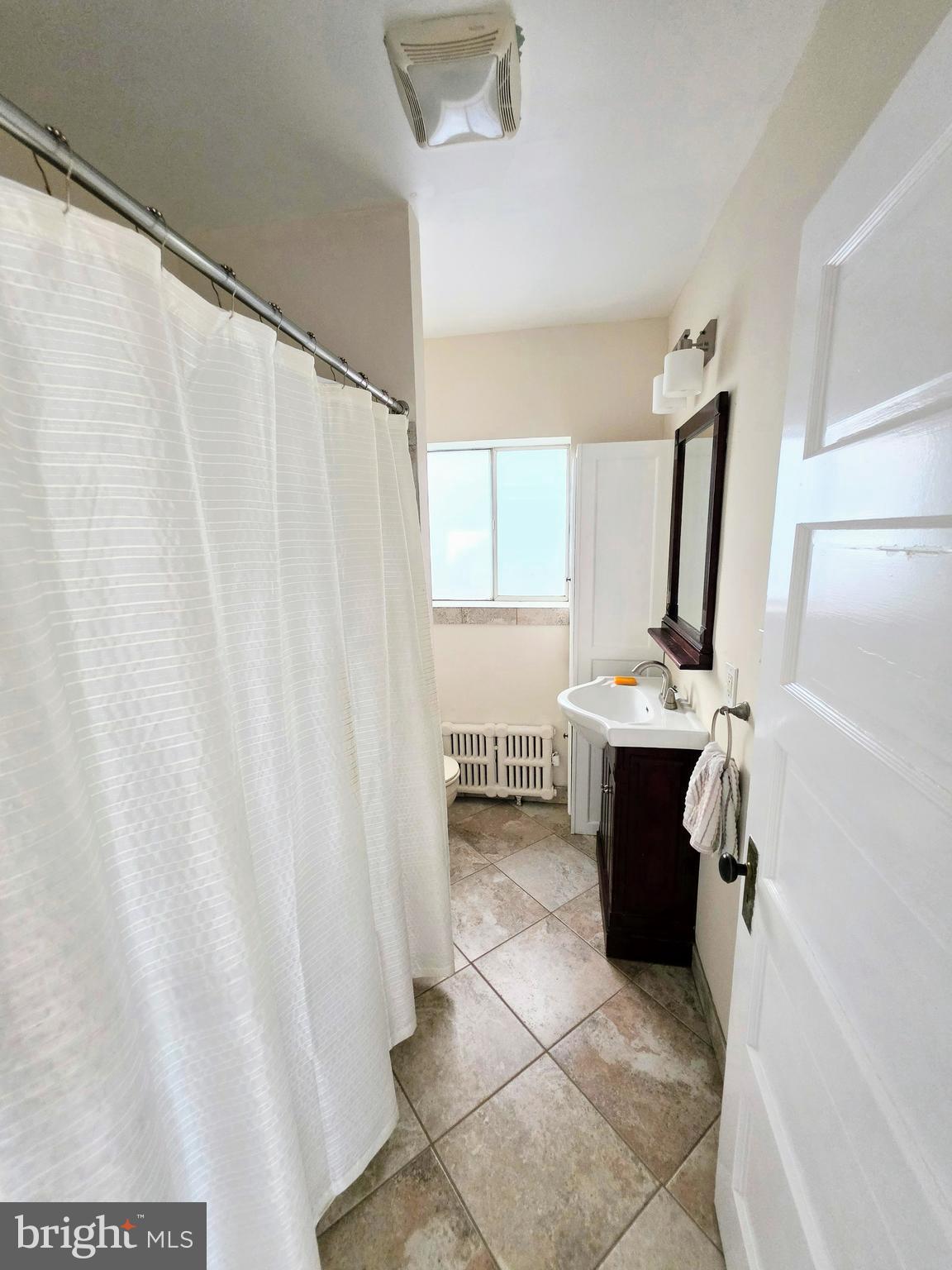 666 Bush Street Bridgeport, PA 19405 - Photo 13 of 18 Upstairs Hall bathroom