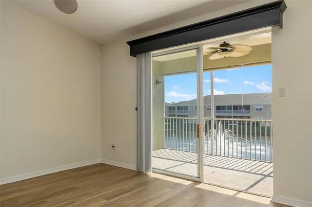 a view of a door and a window