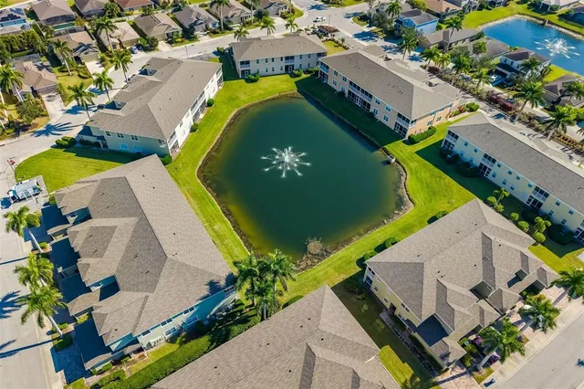 an aerial view of a house with a garden