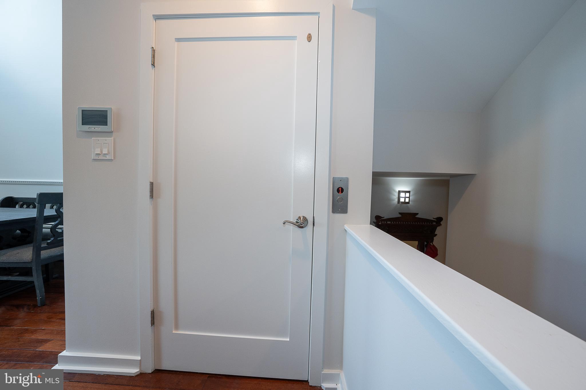601 Poplar Street Philadelphia, PA 19123 - Photo 13 of 41 a view of a hallway with wooden floor and closet