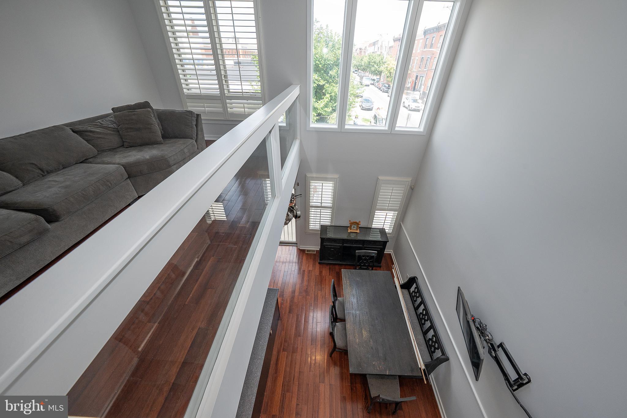 601 Poplar Street Philadelphia, PA 19123 - Photo 15 of 41 a living room with furniture and a wooden floor