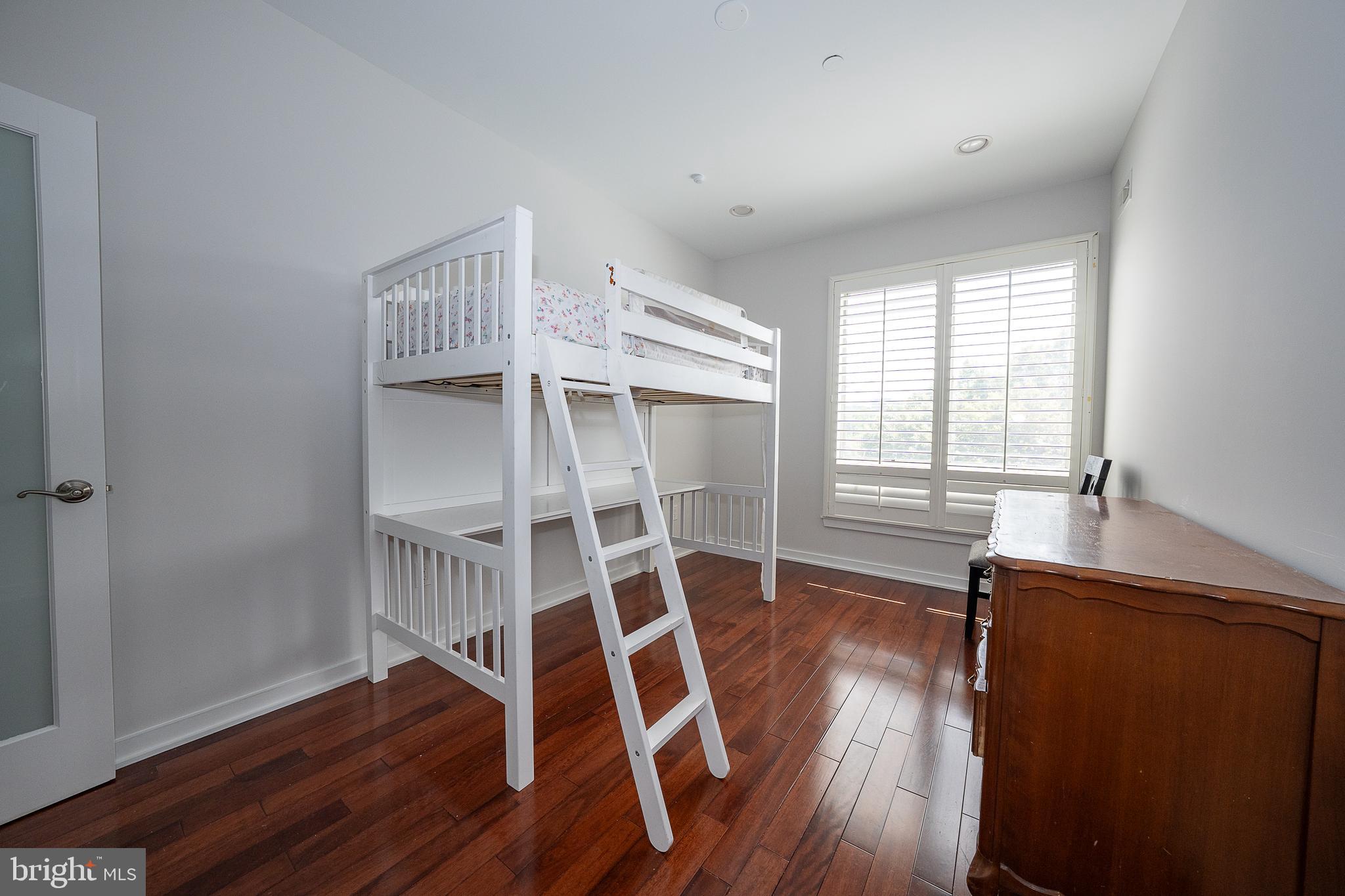 601 Poplar Street Philadelphia, PA 19123 - Photo 21 of 41 a view of a room with wooden floors and windows