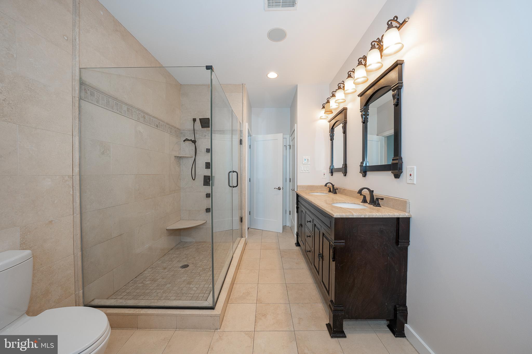 601 Poplar Street Philadelphia, PA 19123 - Photo 28 of 41 a bathroom with a sink a toilet and shower