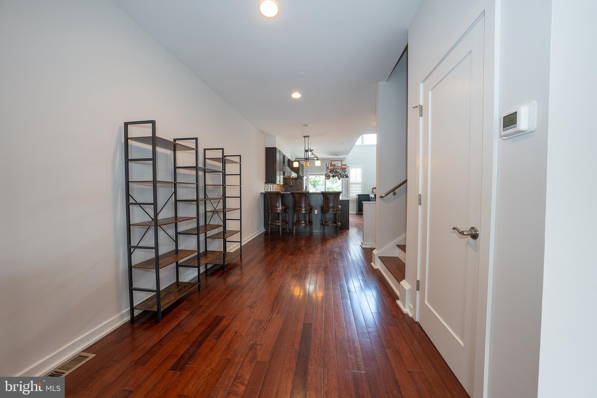 601 Poplar Street Philadelphia, PA 19123 - Photo 7 of 41 a view of a hallway with wooden floor