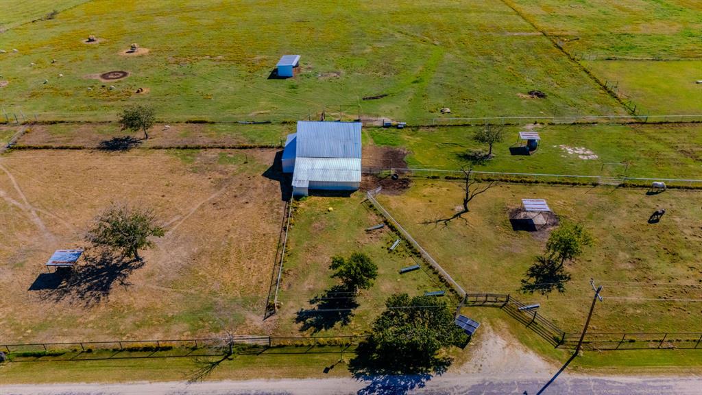 13-acs Strittmatter Road Pilot Point, TX 76258 - Photo 10 of 10 an aerial view of a house with a yard