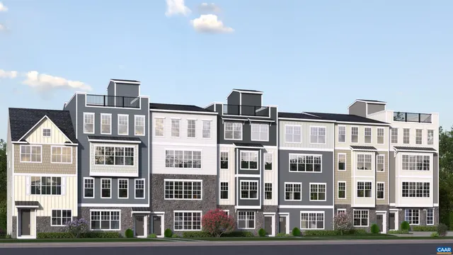 a front view of a building with lot of windows