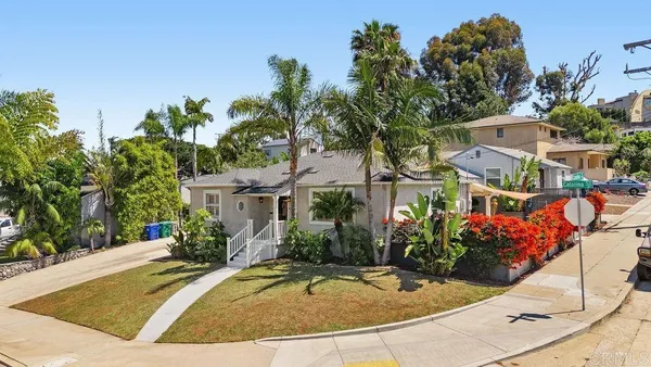 an aerial view of a house with swimming pool