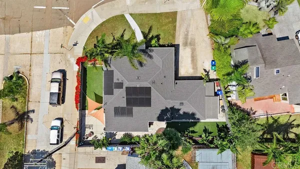 a kitchen with stainless steel appliances granite countertop a sink a stove and a microwave