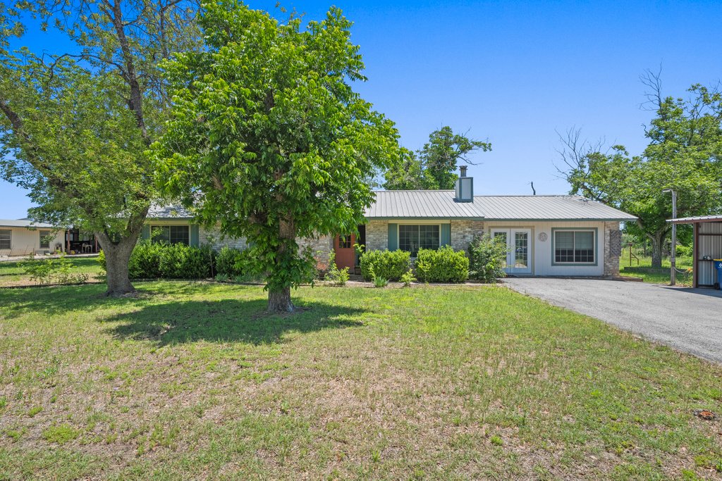 1961 Bolton Road Marion, TX 78124 - Photo 2 of 17 a front view of a house with a yard