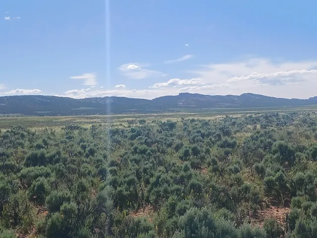 a view of an outdoor space and mountain view