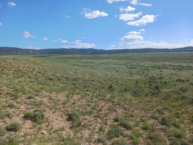 a view of a lake from a balcony