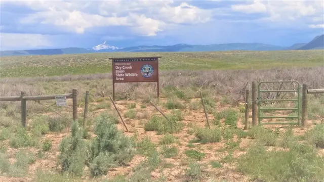 a view of an outdoor space and mountain view in back