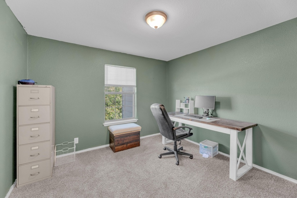 150 Mistletoe Lane Kyle, TX 78640 - Photo 25 of 35 a view of a workspace with furniture