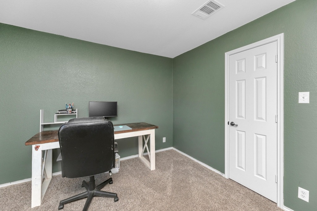 150 Mistletoe Lane Kyle, TX 78640 - Photo 26 of 35 a view of a workspace with furniture