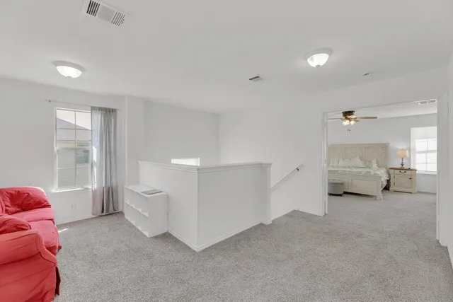 a view of a workspace with furniture