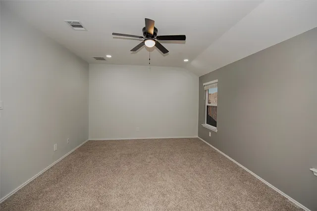 a view of a kitchen with a sink and cabinets