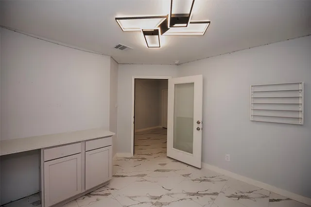 a view of a room with a fan