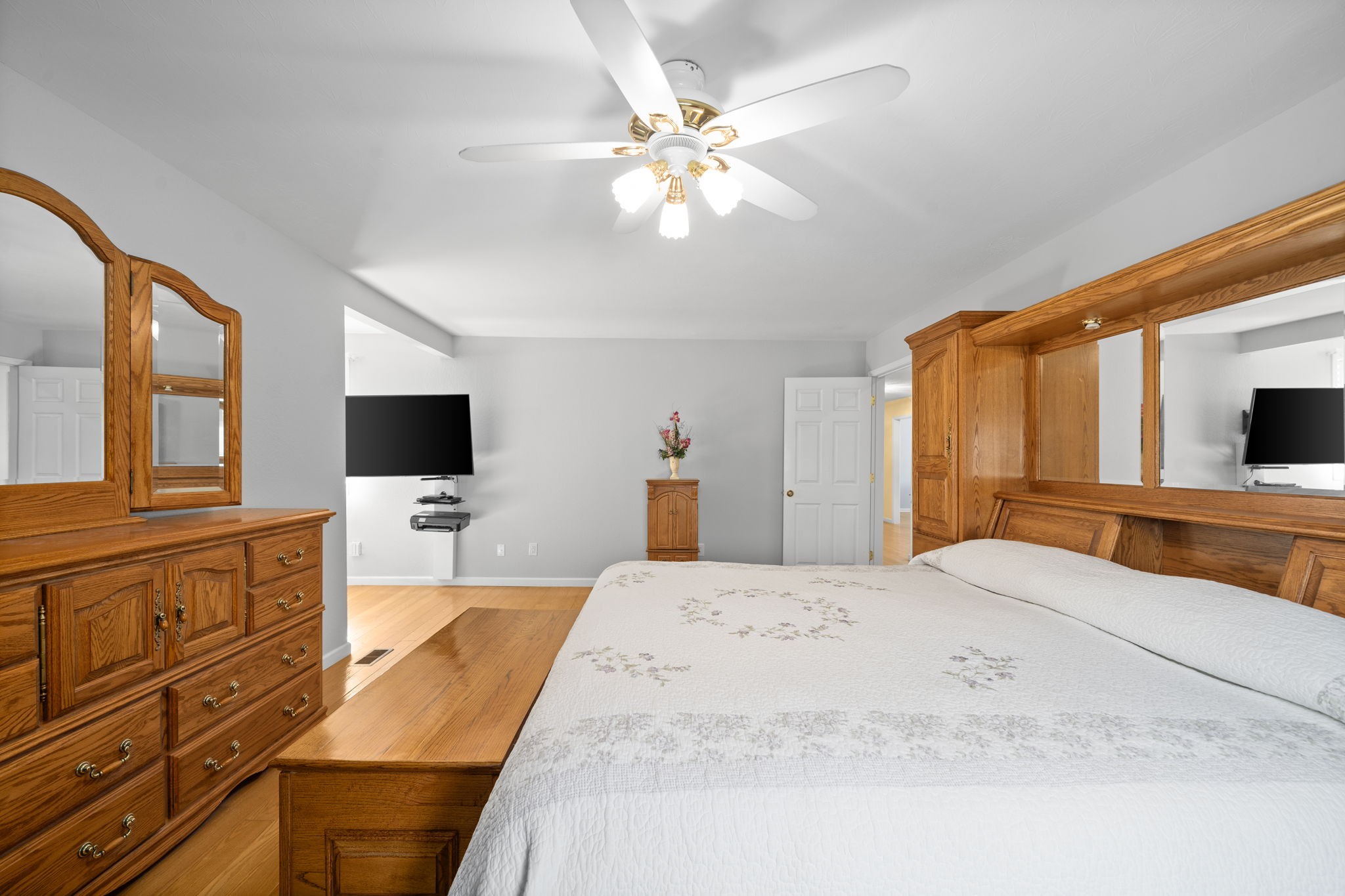 3426 Buck Road Clarksville, TN 37043 - Photo 27 of 57 a bedroom with a large bed and a flat tv screen on dresser