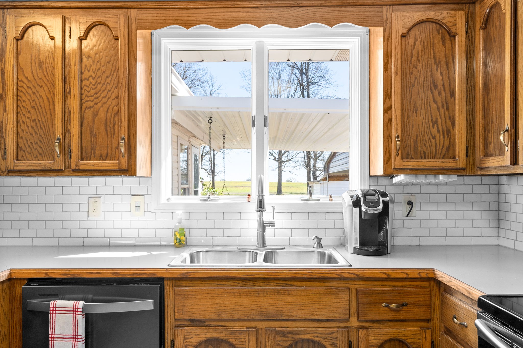 3426 Buck Road Clarksville, TN 37043 - Photo 10 of 57 a kitchen with a sink and cabinets