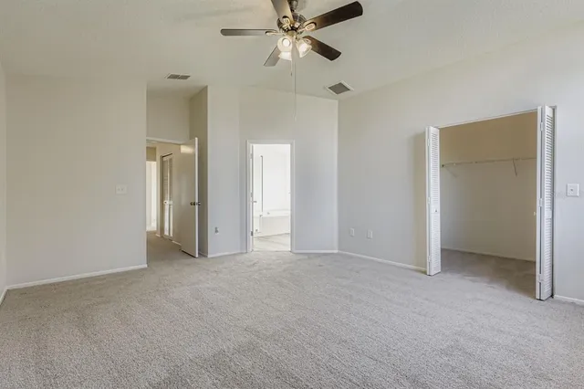 a view of an empty room and window