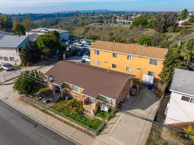 an aerial view of a house with a garden