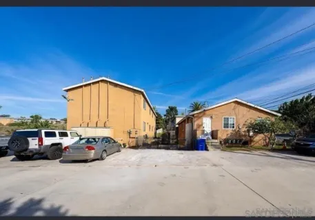 a view of a street with cars