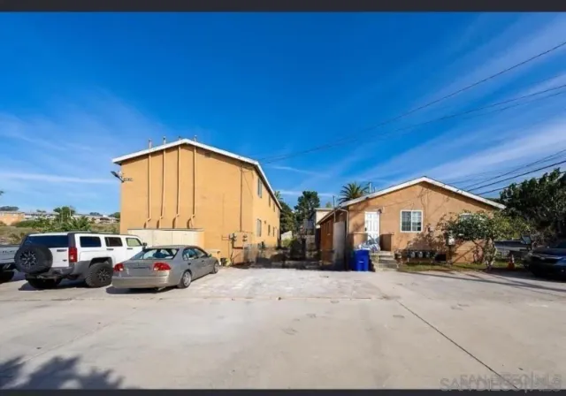 a view of a street with cars