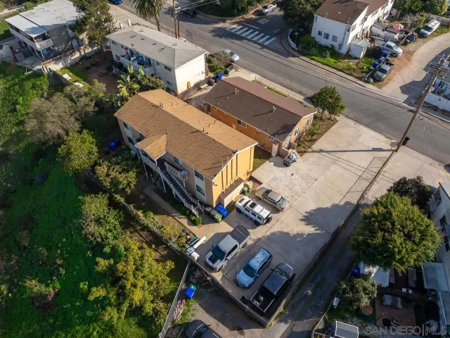 an aerial view of a house with a garden