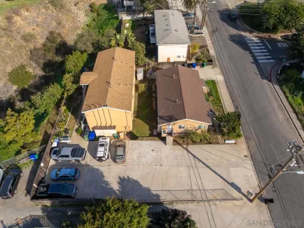 an aerial view of a house with outdoor space