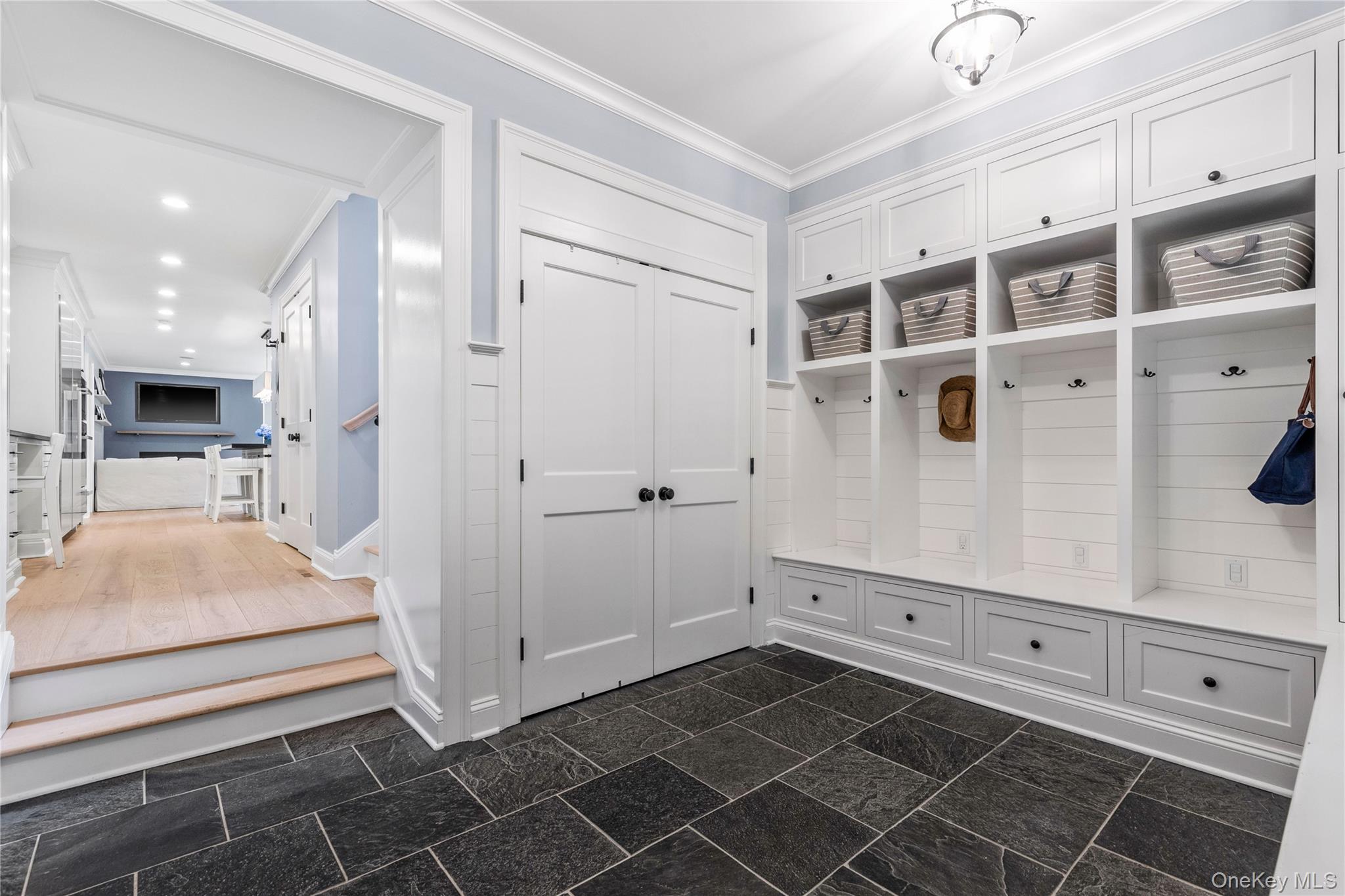 394 Park Avenue Rye, NY 10580 - Photo 15 of 36 Double coat closet & 4 cubbies & backstair case to the 2nd floor