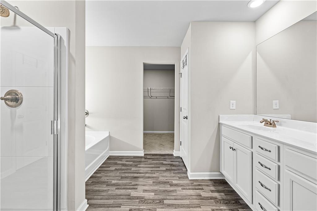 616 Hydrangea Lane Bremen, GA 30110 - Photo 11 of 49 a bathroom with a sink and a mirror