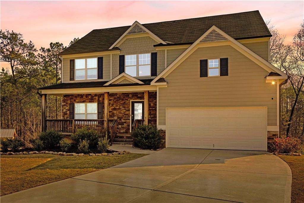 616 Hydrangea Lane Bremen, GA 30110 - Photo 2 of 49 a front view of a house with a yard