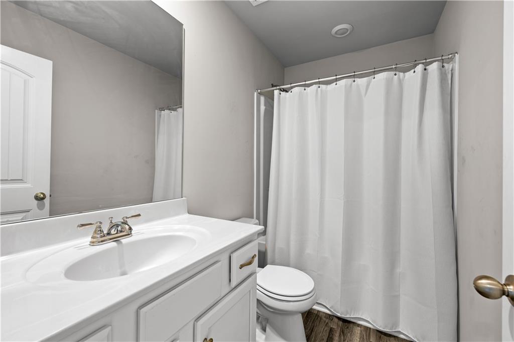 616 Hydrangea Lane Bremen, GA 30110 - Photo 24 of 49 a bathroom with a sink toilet and shower