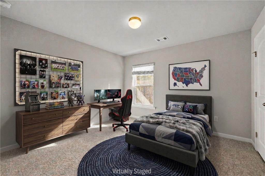 616 Hydrangea Lane Bremen, GA 30110 - Photo 29 of 49 a bedroom with furniture and a window