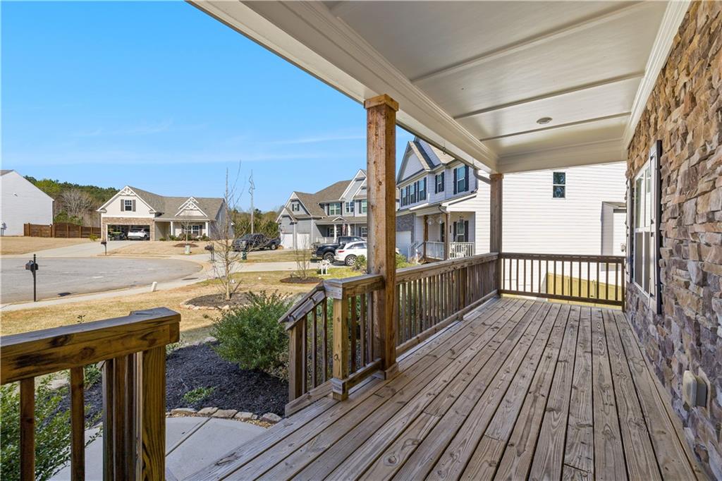616 Hydrangea Lane Bremen, GA 30110 - Photo 35 of 49 a balcony with wooden floor