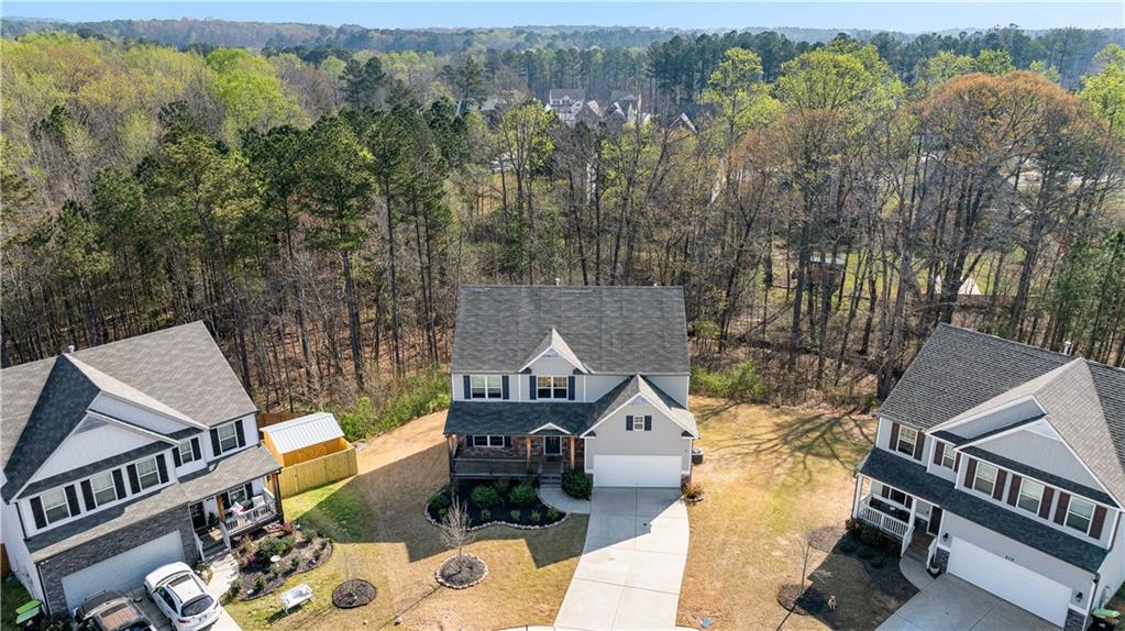 616 Hydrangea Lane Bremen, GA 30110 - Photo 42 of 49 an aerial view of a house with a yard