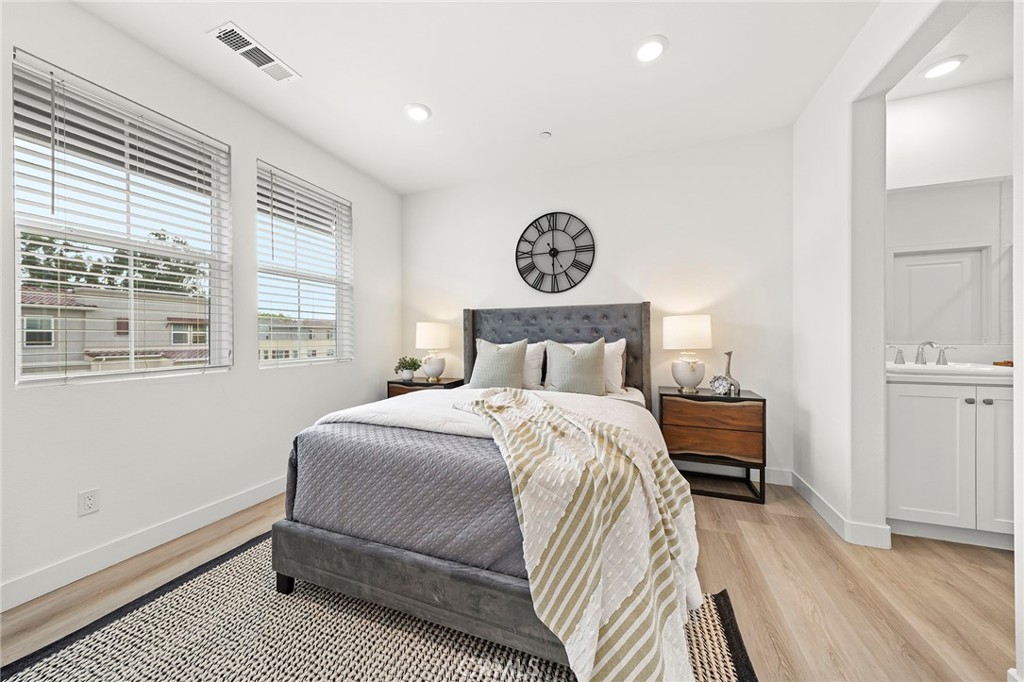 1533 St Simon Circle, Unit B Alhambra, CA 91803 - Photo 11 of 27 a bedroom with a bed and a window