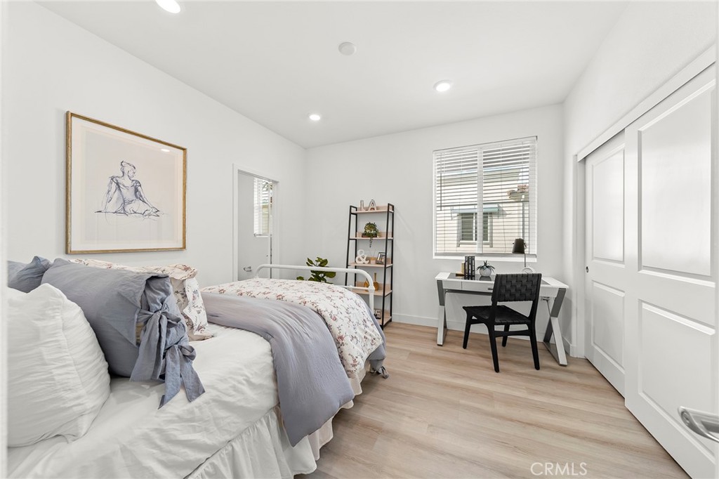 1533 St Simon Circle, Unit B Alhambra, CA 91803 - Photo 14 of 27 a bed room with a bed and a desk