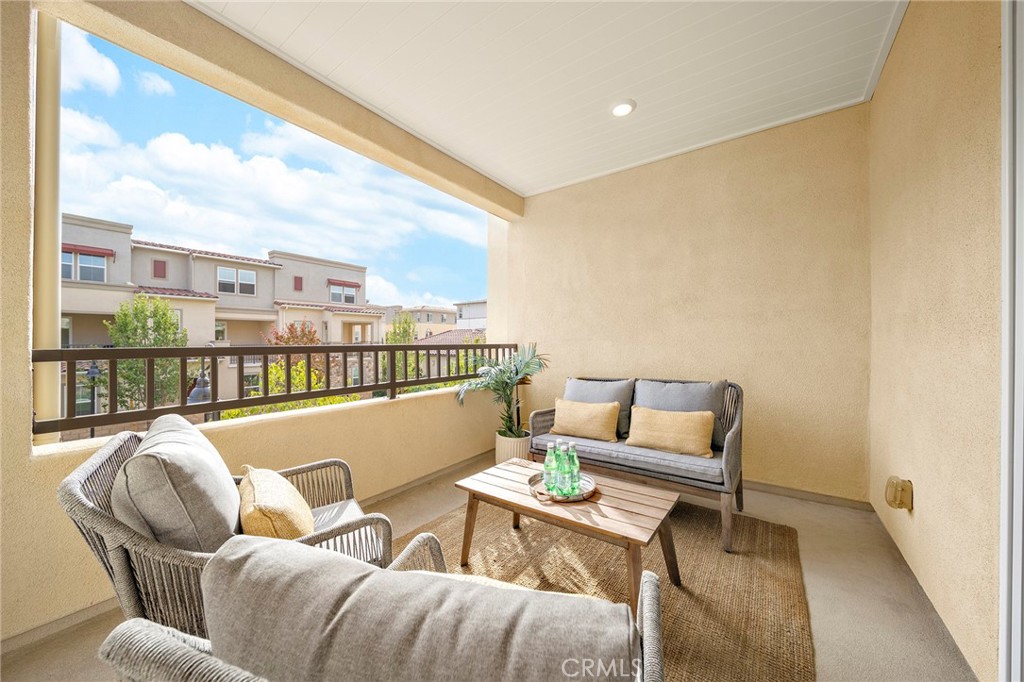 1533 St Simon Circle, Unit B Alhambra, CA 91803 - Photo 20 of 27 a balcony with furniture and a table