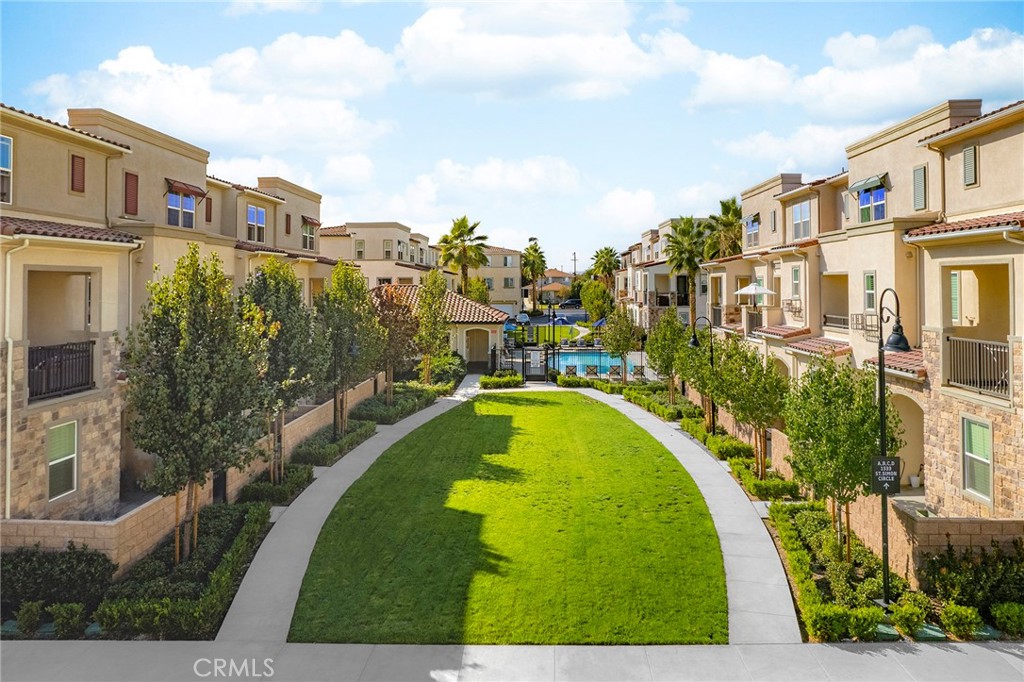 1533 St Simon Circle, Unit B Alhambra, CA 91803 - Photo 2 of 27 a view of an swimming pool with a garden