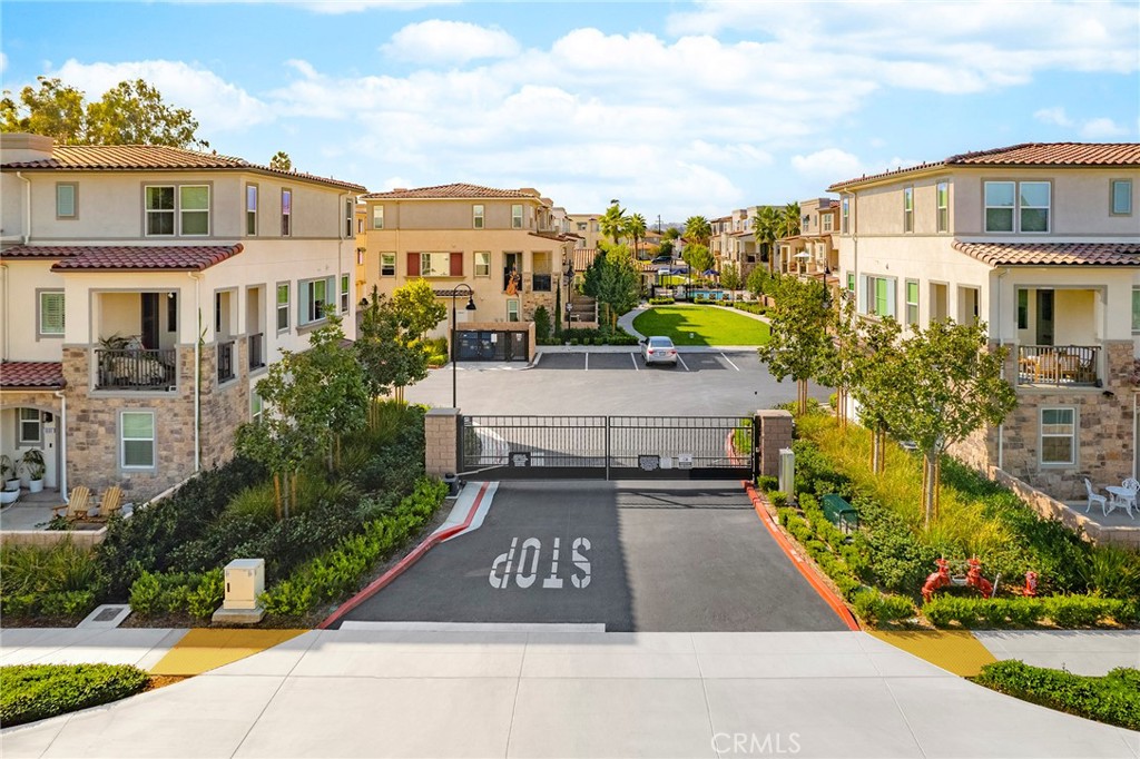 1533 St Simon Circle, Unit B Alhambra, CA 91803 - Photo 27 of 27 a view of multiple houses with a yard