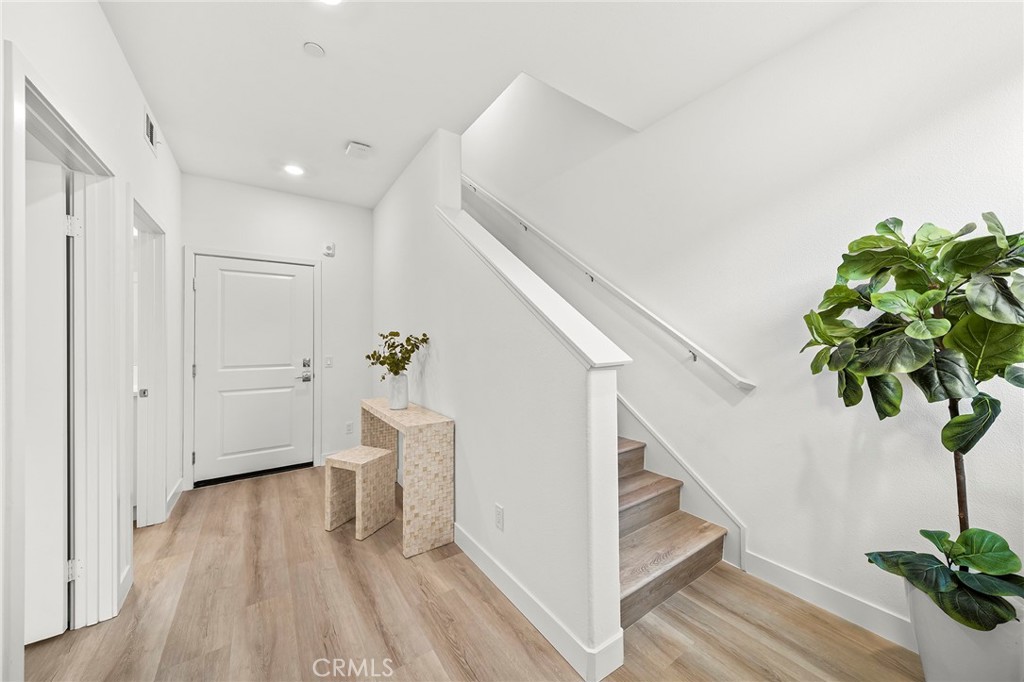 1533 St Simon Circle, Unit B Alhambra, CA 91803 - Photo 5 of 27 a view of entryway with wooden floor