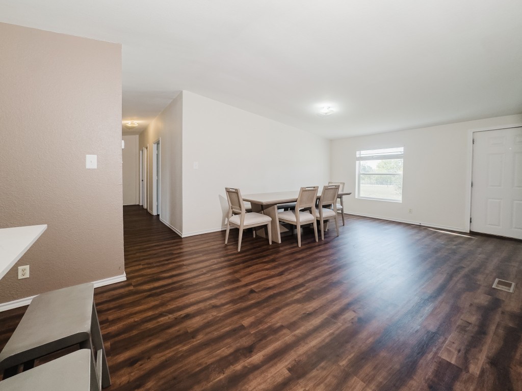 2709 County Road 463 Elgin, TX 78621 - Photo 16 of 40 Dining area featuring dark wood-style flooring