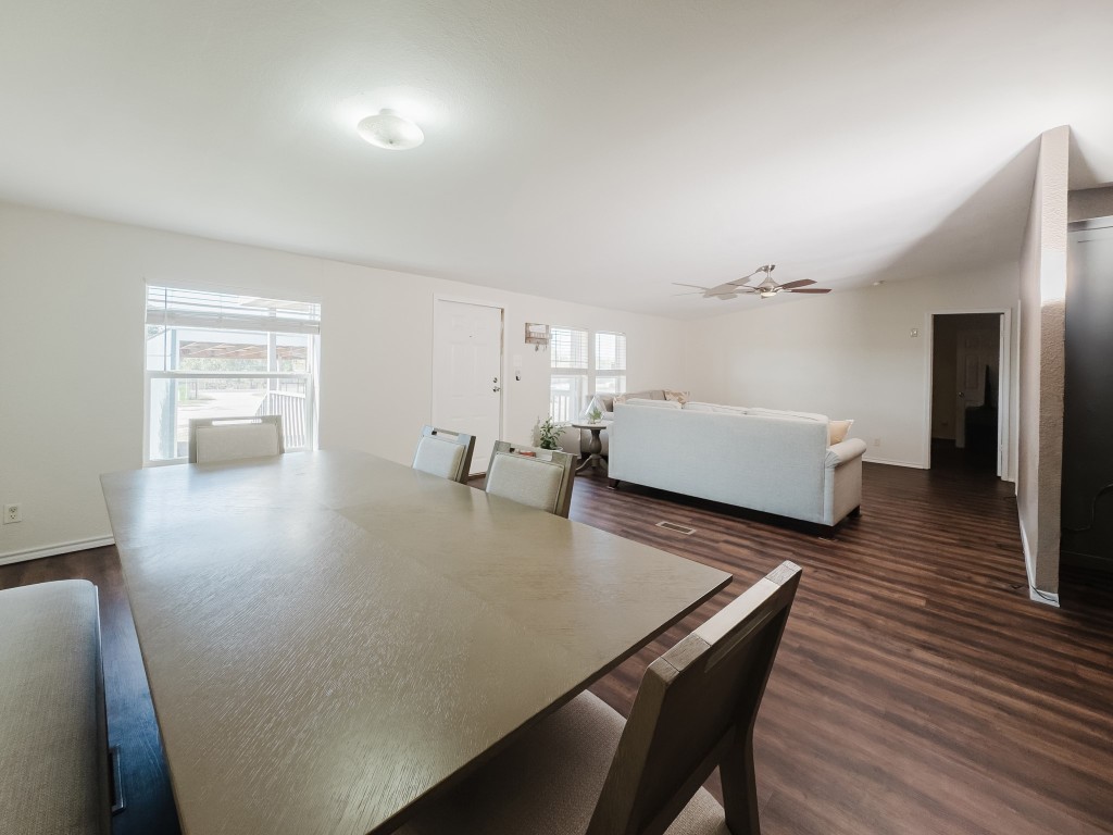 2709 County Road 463 Elgin, TX 78621 - Photo 17 of 40 Dining room featuring dark wood-style floors and a ceiling fan