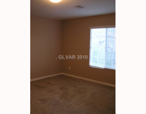 10352 Hawk Ravine Street Las Vegas, NV 89178 - Photo 9 of 10 Master Bedroom.