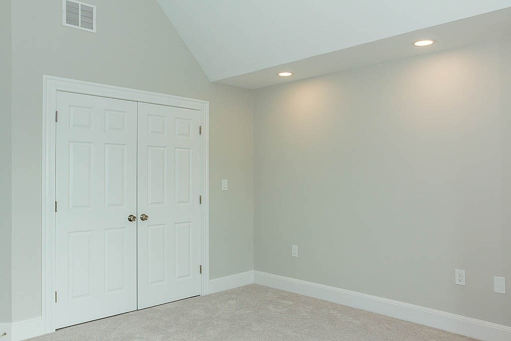 171 Walnut Street, Unit 4 Boston, MA 02122 - Photo 18 of 31 wooden floor in an empty room