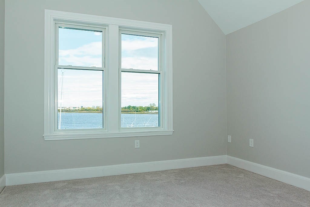 171 Walnut Street, Unit 4 Boston, MA 02122 - Photo 23 of 31 an empty room with a window