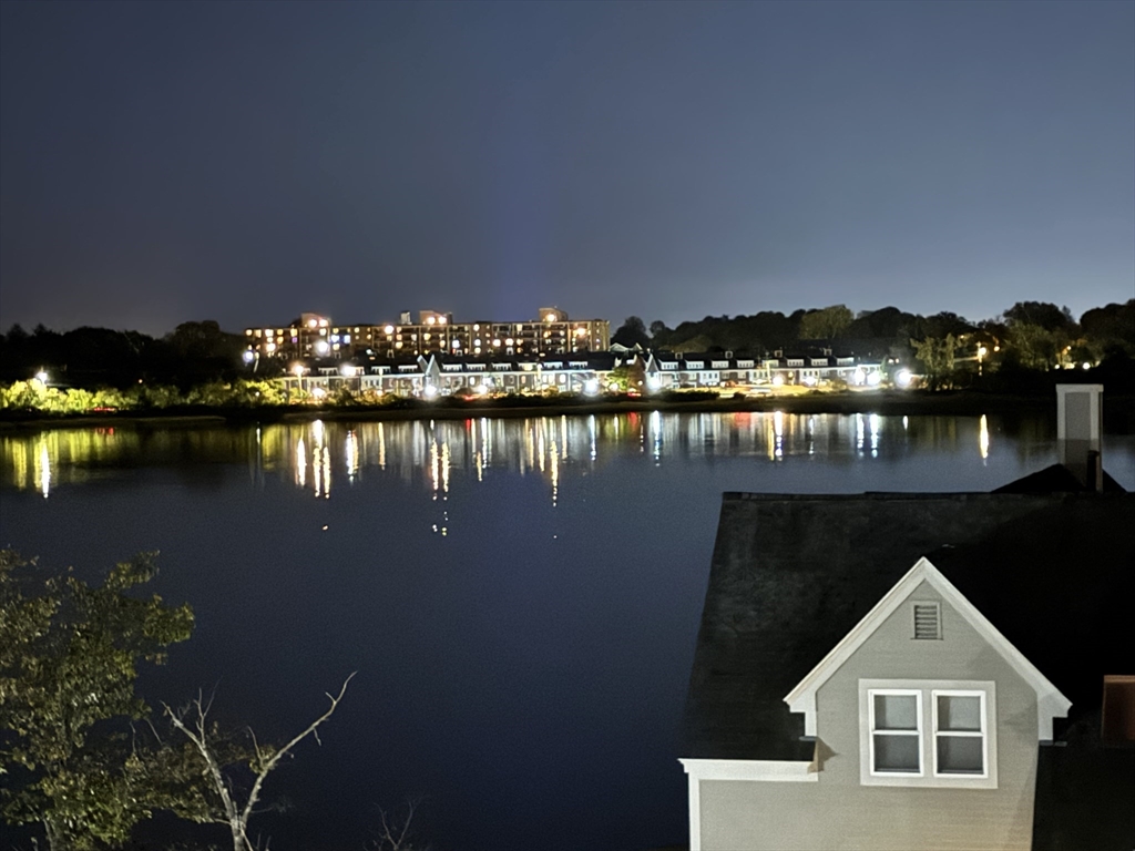 171 Walnut Street, Unit 4 Boston, MA 02122 - Photo 31 of 31 a front view of a house with lake view