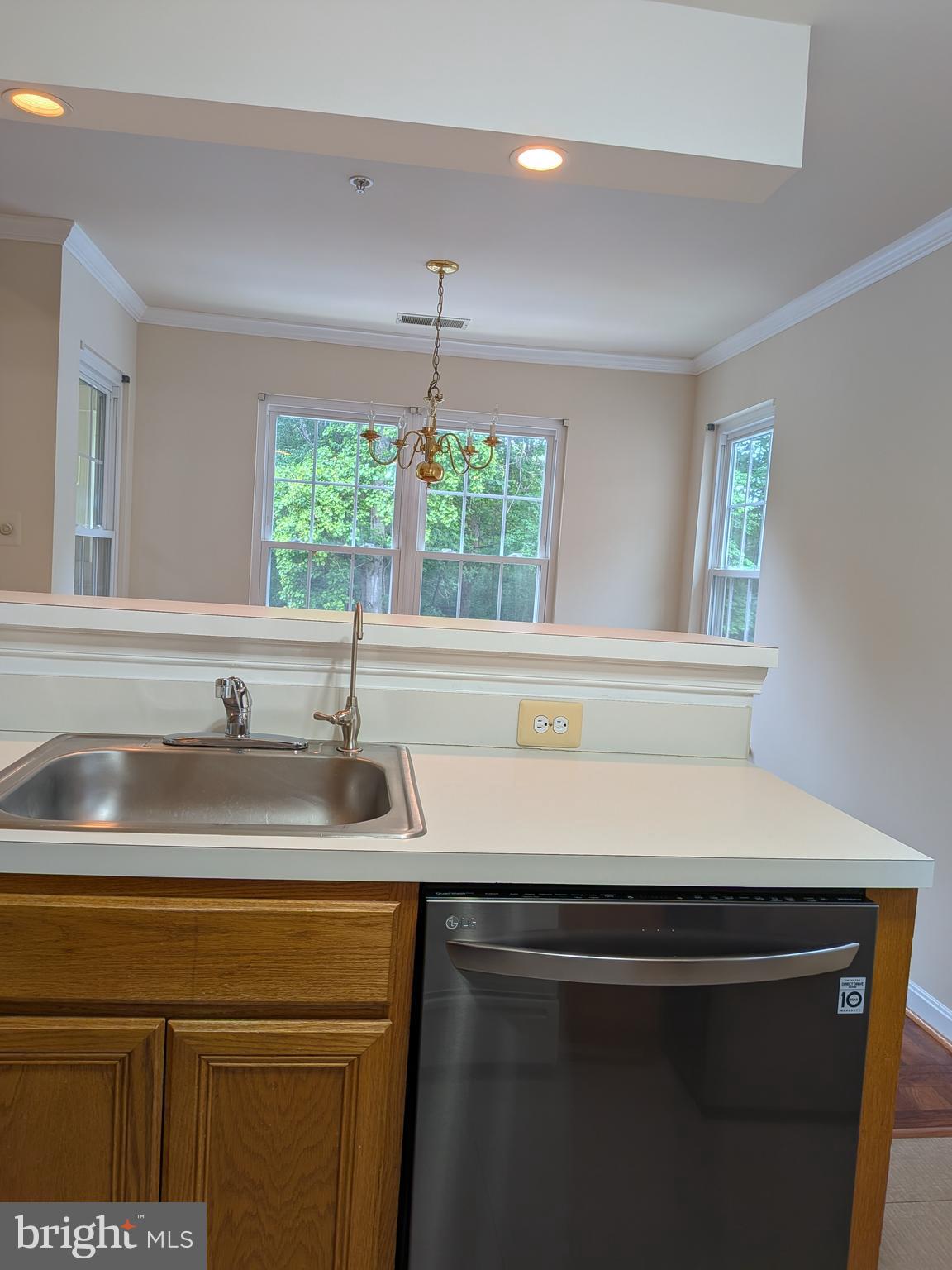 109 Timberbrook Lane, Unit 301 Gaithersburg, MD 20878 - Photo 9 of 22 a kitchen with a sink and a window