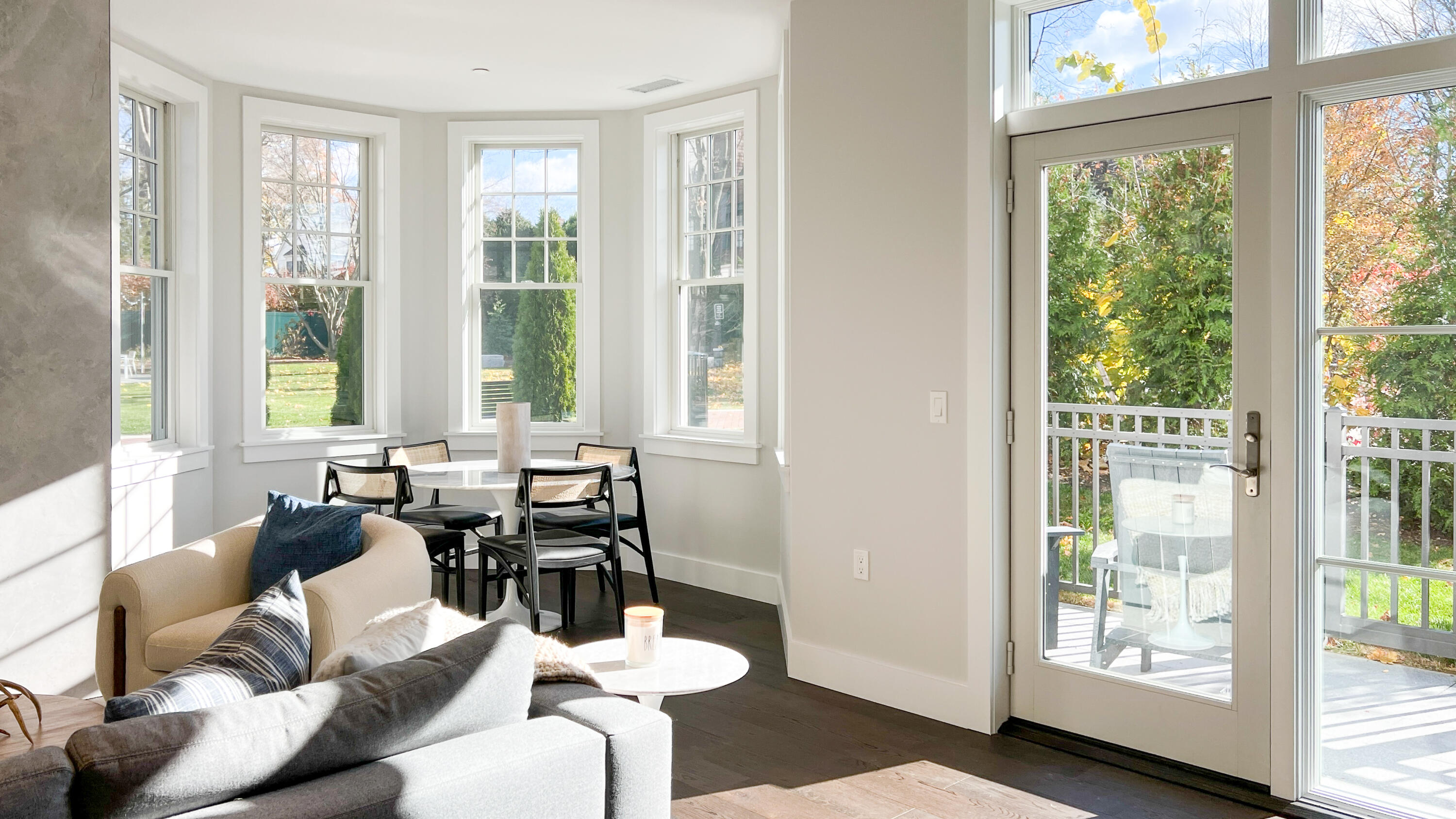 180 Park Street, Unit 204 New Canaan, CT 06840 - Photo 14 of 31 a living room with furniture and floor to ceiling windows